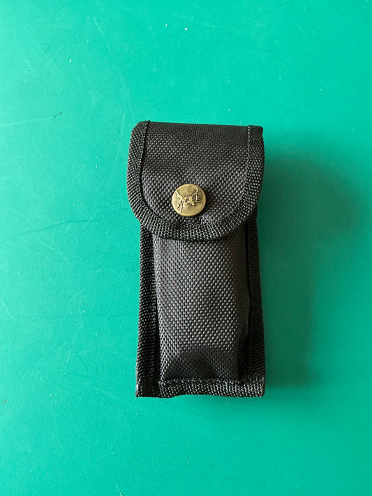 Miniature Self Defense Flashlight and an Electroshock device with a case.
