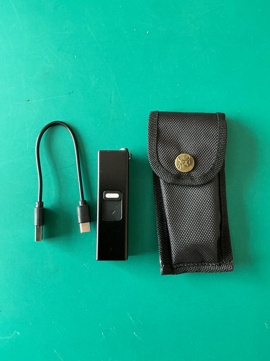 Miniature Self Defense Flashlight and an Electroshock device with a case.