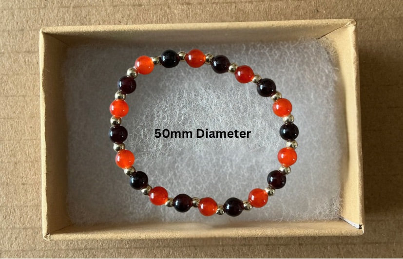 Red, Black & Gold Bracelet With Box.