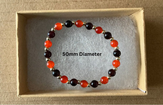 Red, Black & Gold Bracelet With Box.