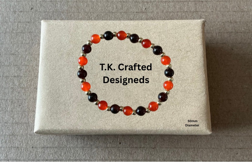 Red, Black & Gold Bracelet With Box.