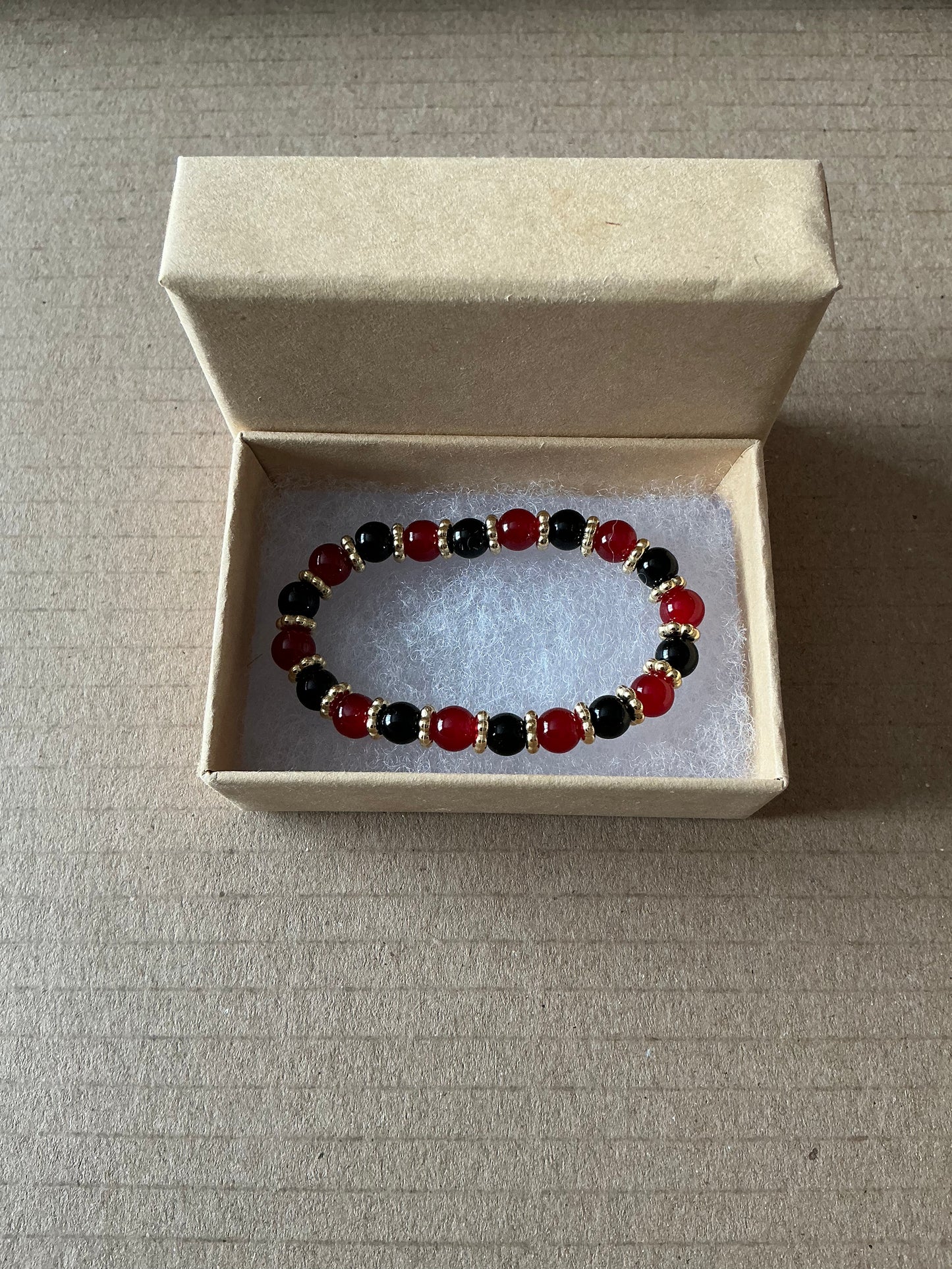 Red , Black, Gold Bracelet With Box’
